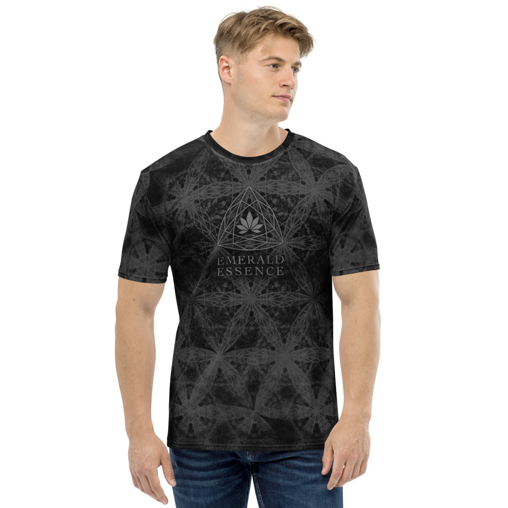 A man sports a well fitting all over print t-shirt of a black and gray pattern